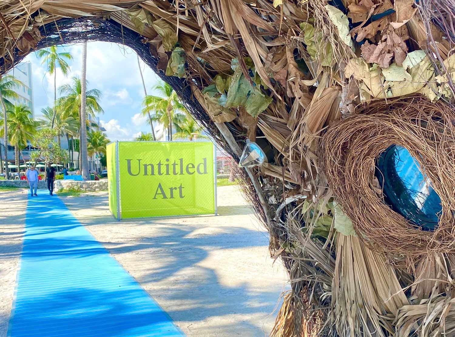 Taking inspiration from the nest of a satin Bower bird, 'Crossing to the Unlimited Ocean' is a unique outdoor art installation by artist Katja Loher that serves as the walkway to the Untitled Art Fair