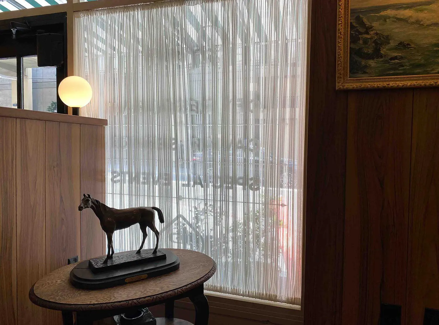 Palihotel San Francisco Lobby sitting area full of curios