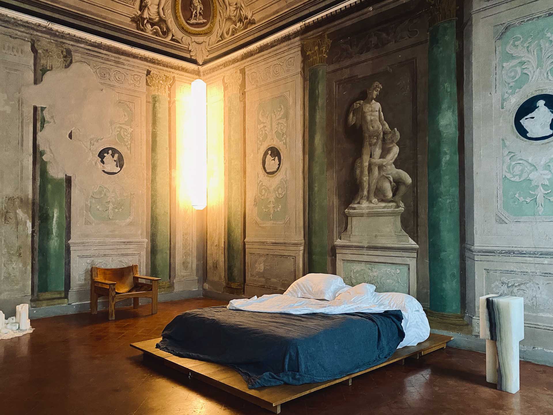 The frescoed walls of Loft I, one of six exquisite bedrooms at Numeroventi