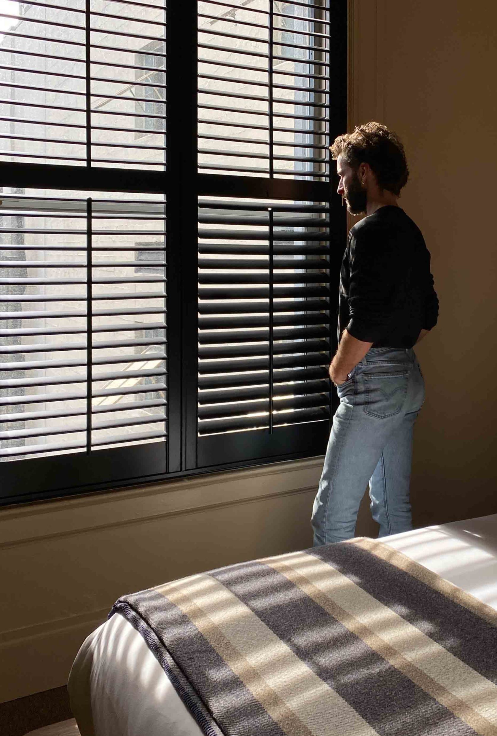 Photographer Matthew Placek enjoying the city dwelling life in the King suite room