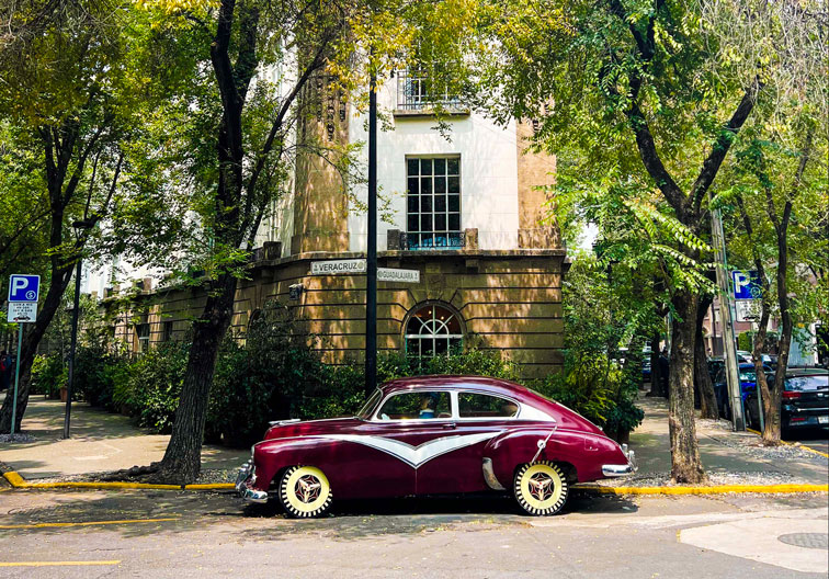 Condesa DF Fun fact: The 1928 French neo-classical building is heritage-protected by the Instituto Nacional de Bellas Artes. Did you know that classic car outside is also a music box?
