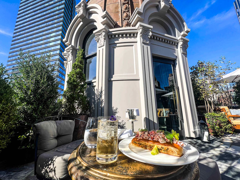 The Ned Nomad Felling glorious having a bite at the rooftop restaurant terrace while getting fresh air