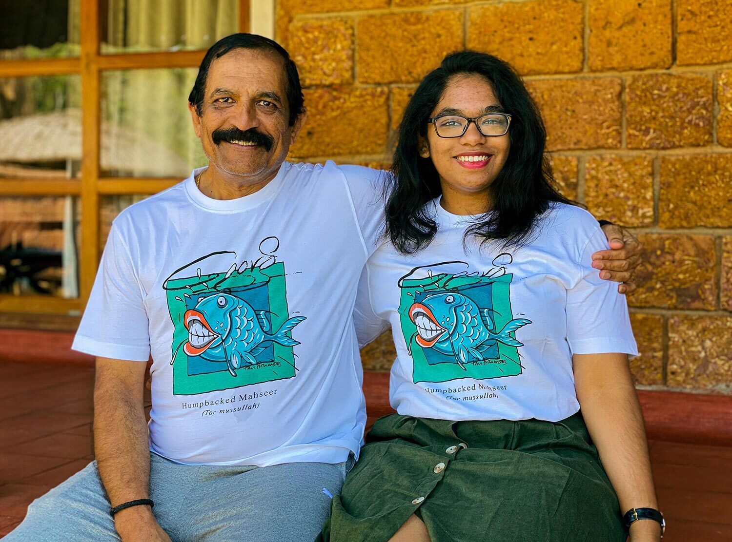 Evolve Back, Coorg Appa and I proudly repping our matching Evolve Back T-shirts acquired at Haystack, the gift shop