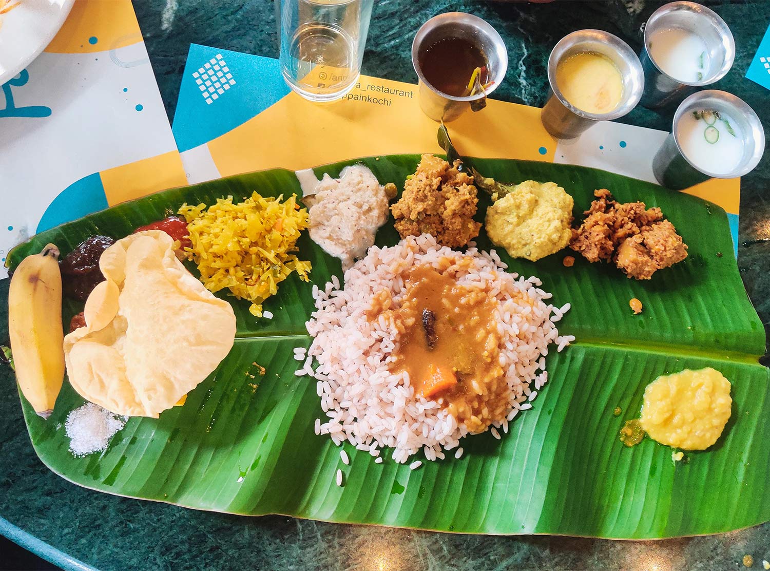 Kerala's signature vegetarian meal served on a plantain leaf. Photo by Supreeth Suresh