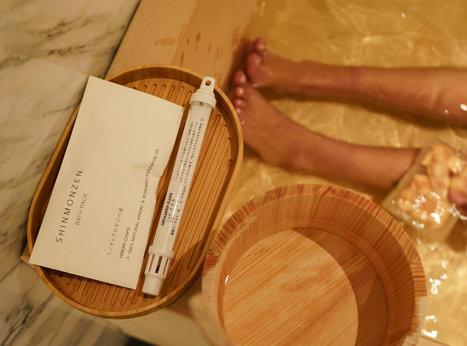 The Shinmonzen The hospitality went beyond our imagination — the bath was set with hinoki wood chips and kuromoji essential oil