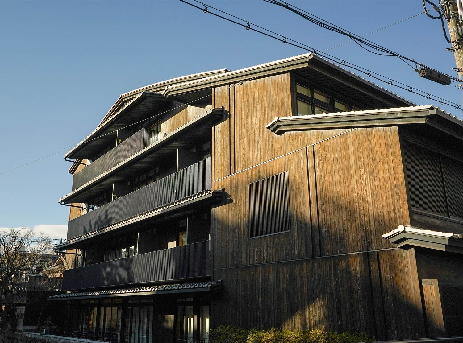 The Shinmonzen Nine elegant suites designed by Tadao Ando, all overlooking the Shirakawa River