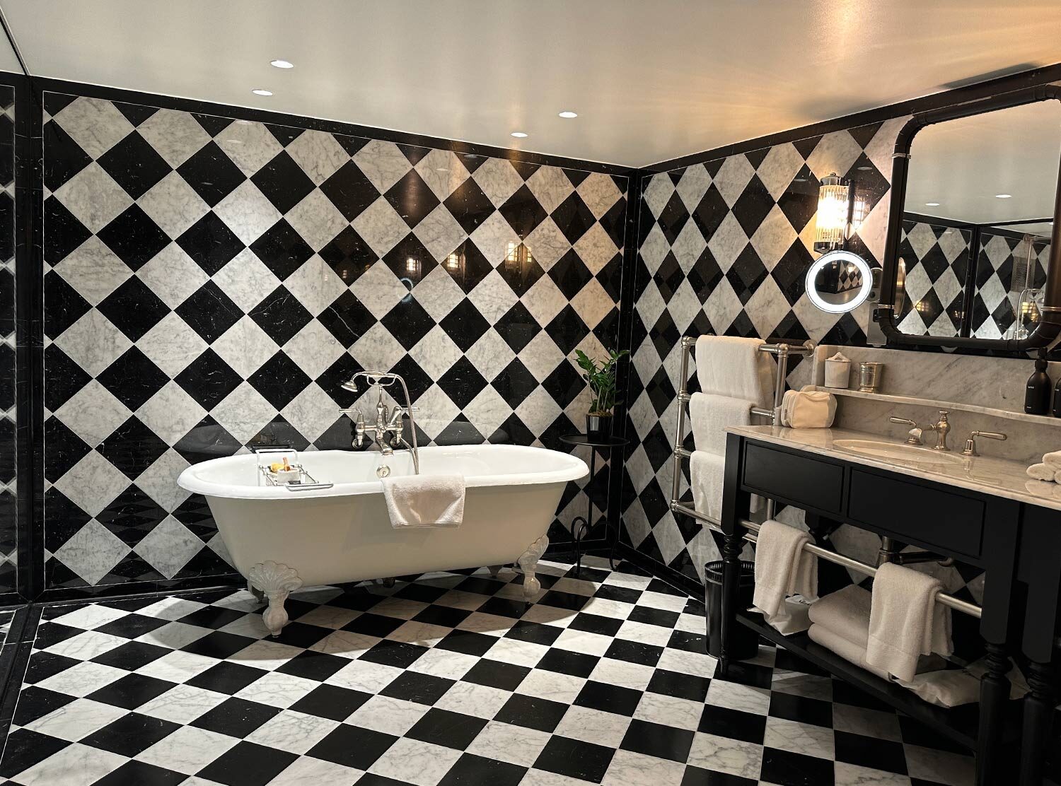 The Twenty Two Not all rooms come with a bathtub, but they are all made in this crowd-pleaser black and white marble