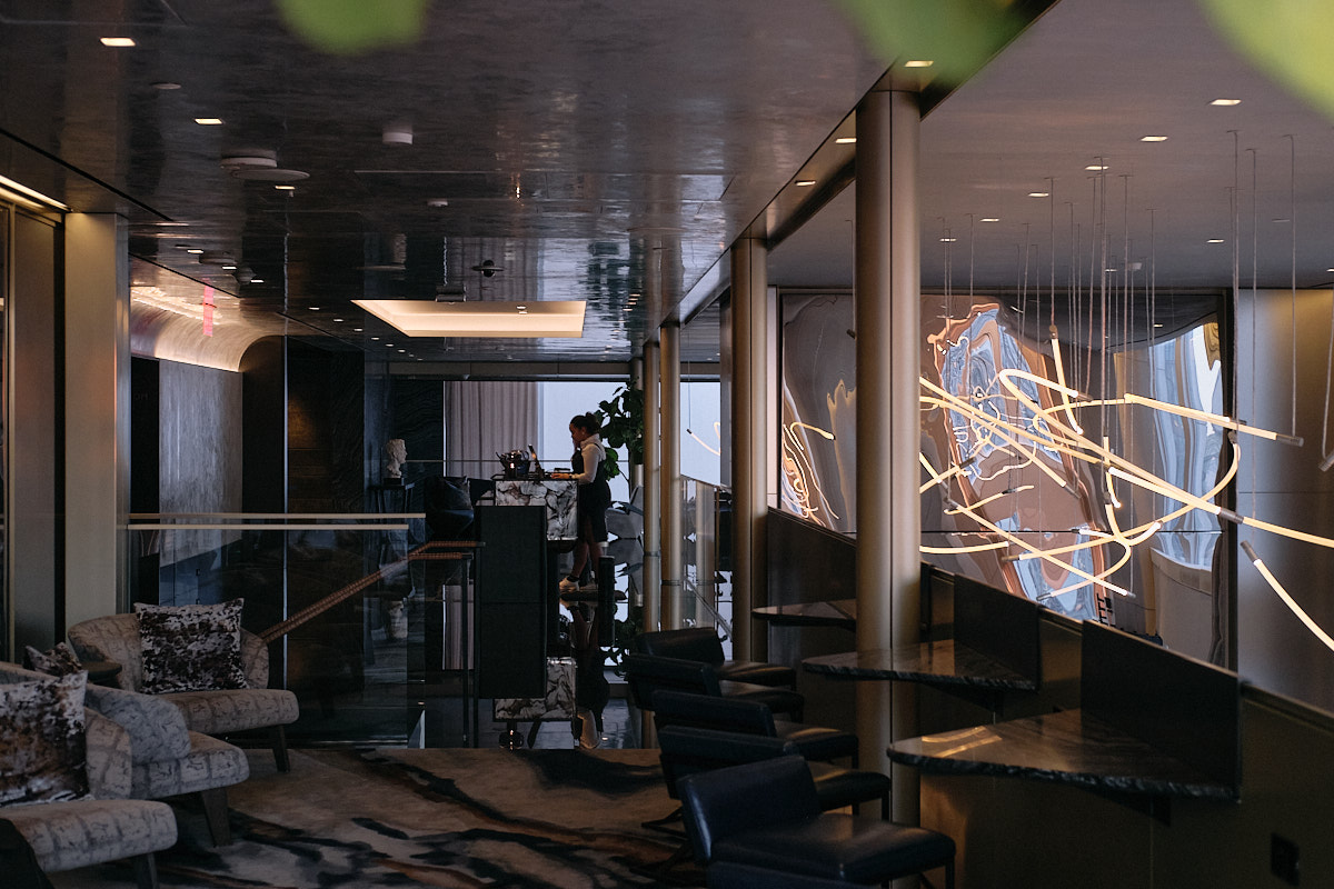 EQUINOX HOTEL NEW YORK The lobby on the 4th floor. The neon we see hanging on the right is part of Electric Lemon bar and restaurant 