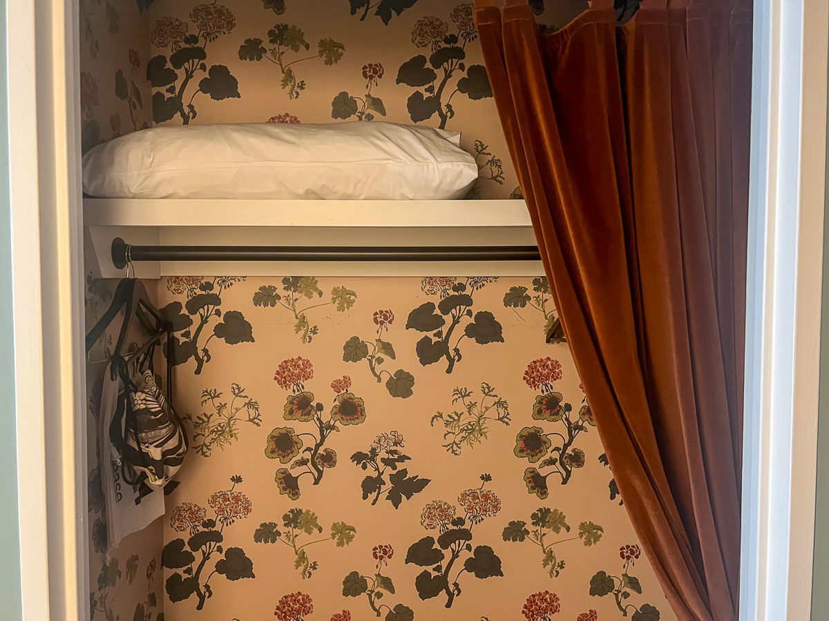 Romer Hell’s Kitchen It’s all in the details, like the closet’s floral interior peeking out from behind a velvet curtain.