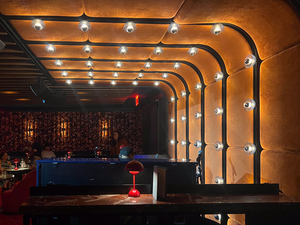 Romer Hell’s Kitchen Bright lights, piano nights.