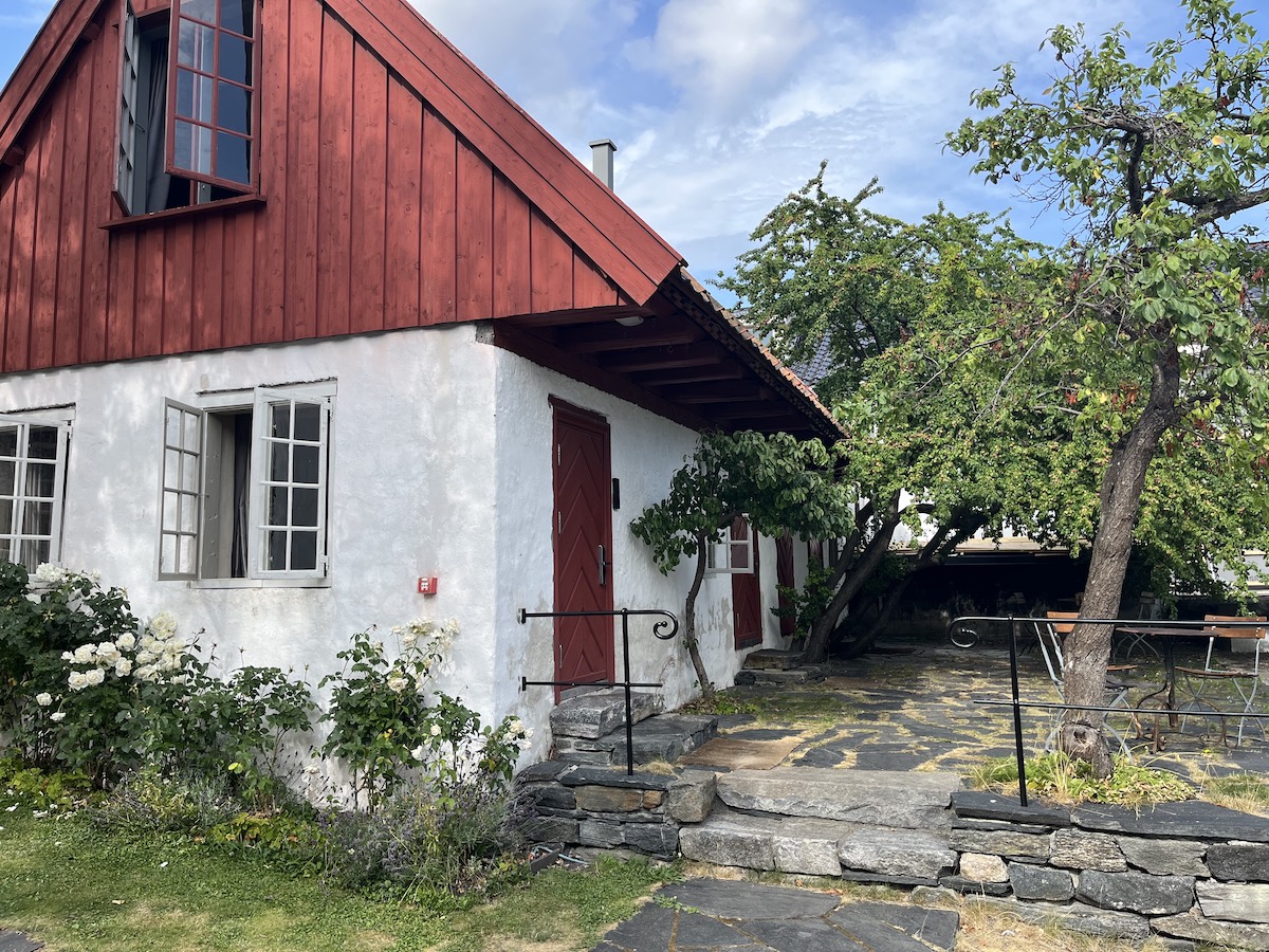 Tollboden Hotel This is what gets my heart pumping. An enchanted countryside courtyard with rose bushes 