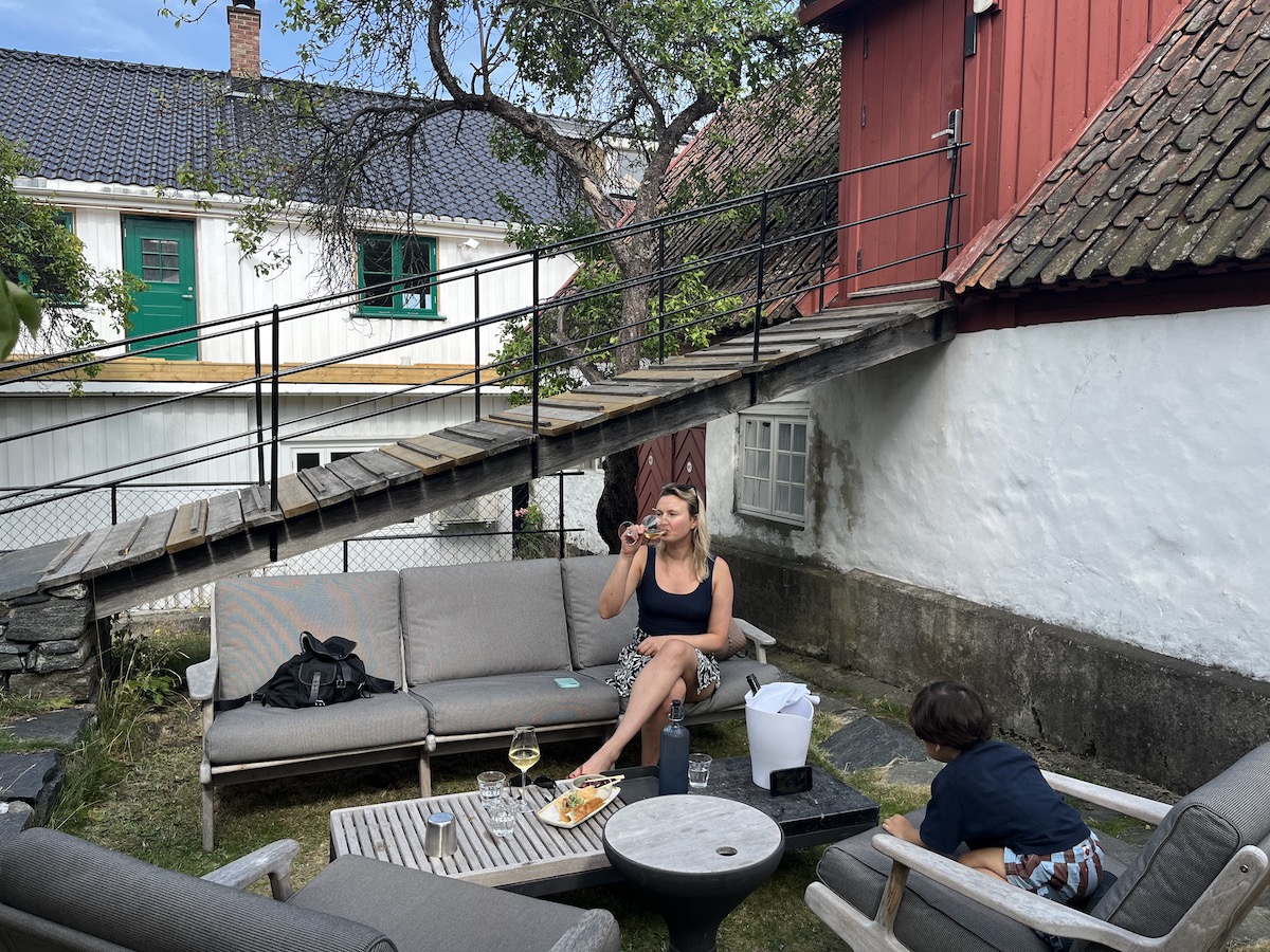 Tollboden Hotel Such a nice afternoon spot, under the barn with little snack and a glass of chilled