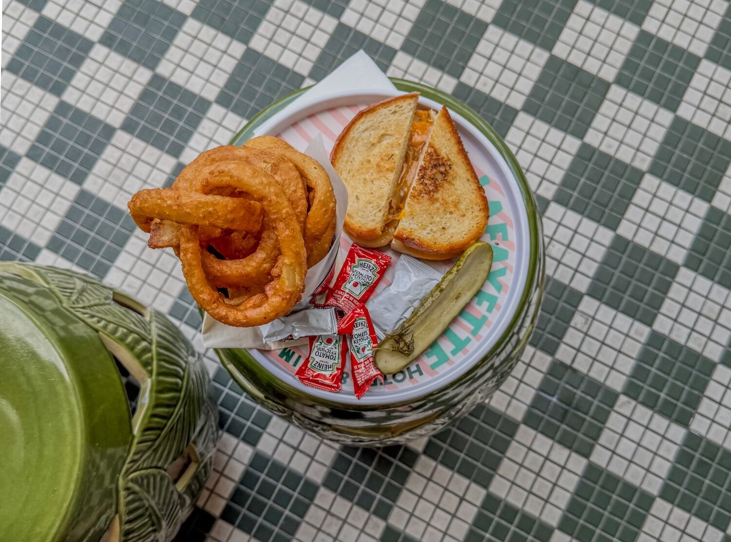 Lafayette Hotel San Diego Grilled cheese, pickles and onion rings by the pool, my kind of place