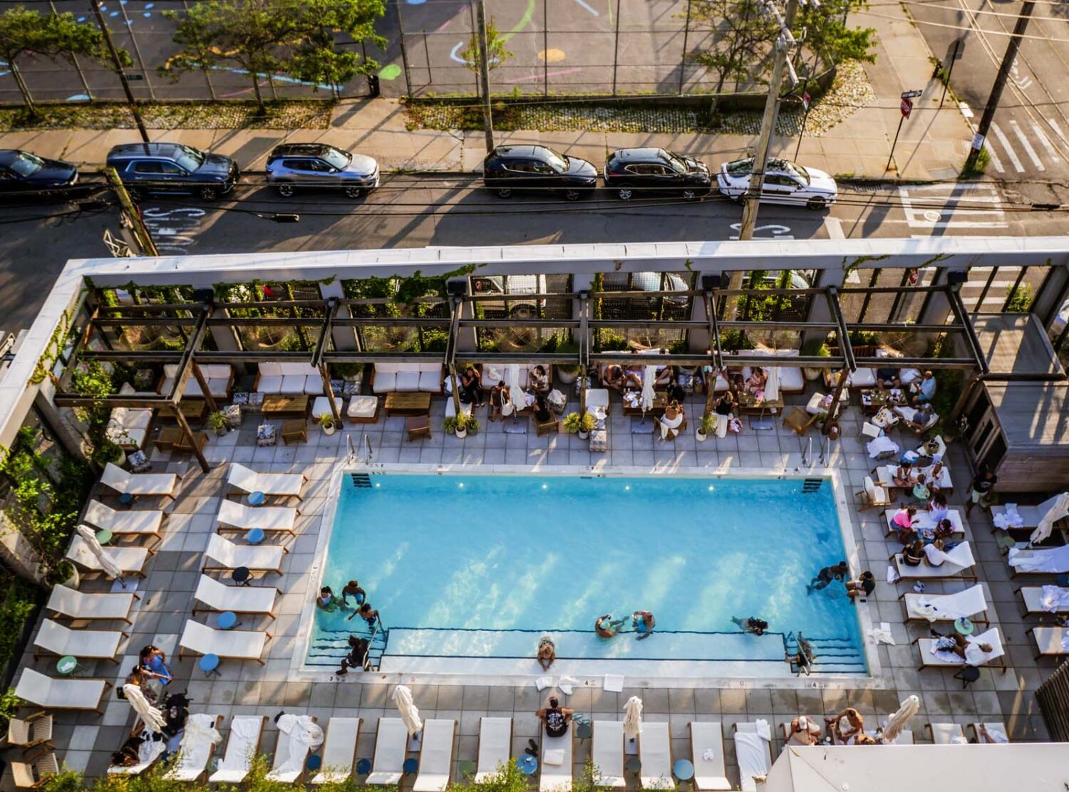 The Rockaway Hotel a view from above: the heated pool and cedar sauna double as a social hub, complete with cocktails, cabanas, and day passes for locals.