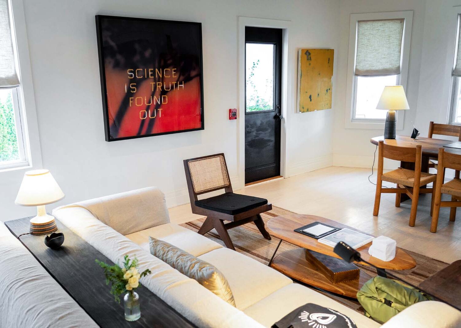 The James Bradley Front desk reception: crisp sofas and bold contemporary art creating a gallery-like lounge, with a strong curatorial eye for design.