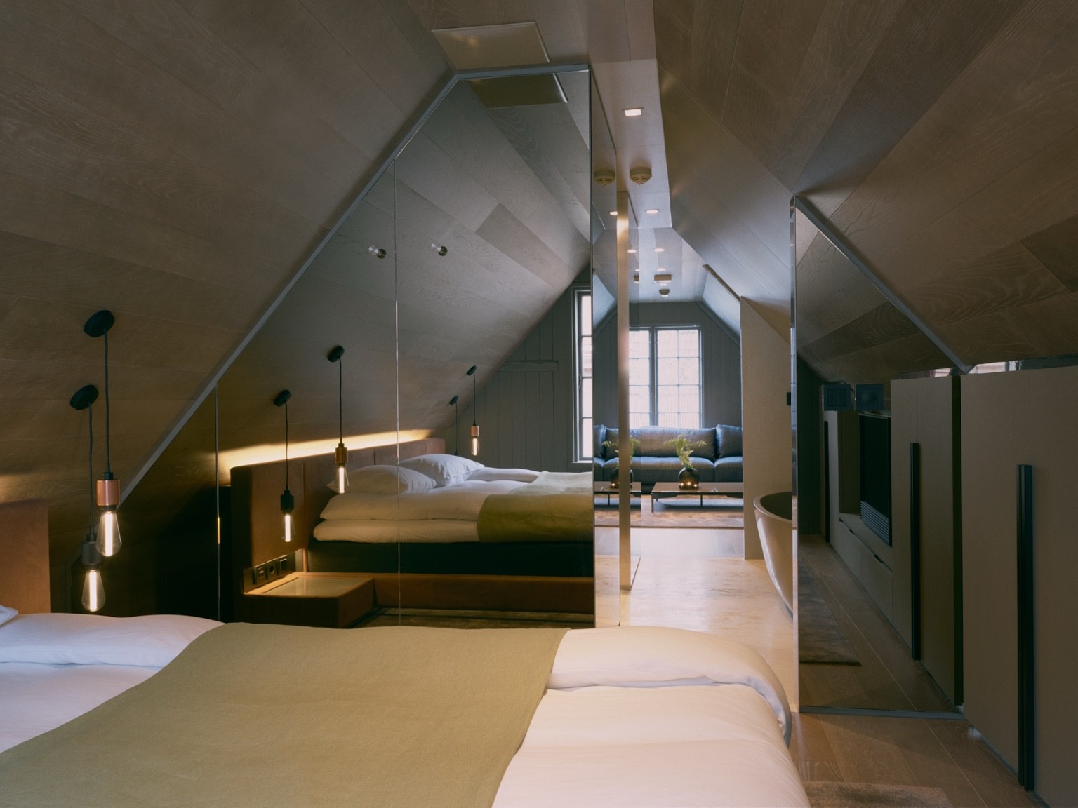 Contemporary fixtures inside a historic building at Tollboden Hotel in Kragerø, Norway.