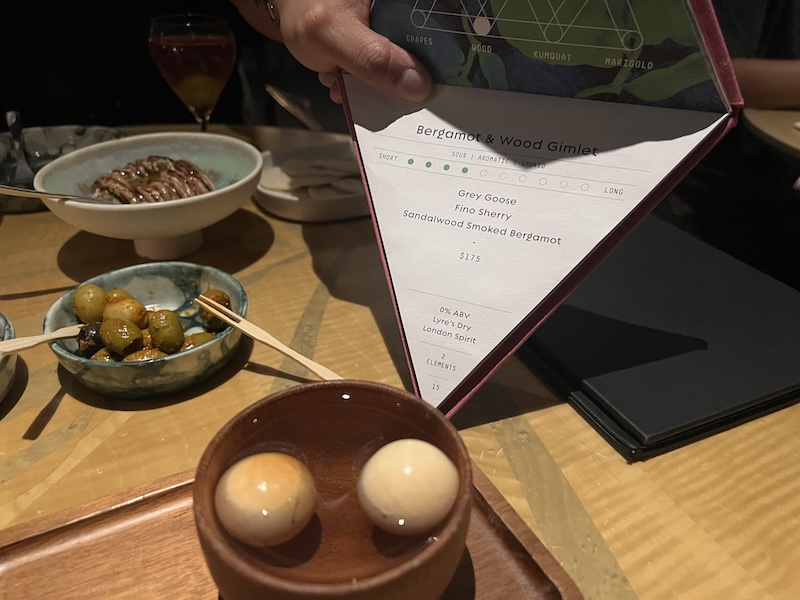 Four Seasons Hotel Hong Kong I ordered the “Bergamot & Wood Gimlet” downstairs at the award winning bar, Argo (Yes, those egg-looking things are actually made of wood.) Smoky! 