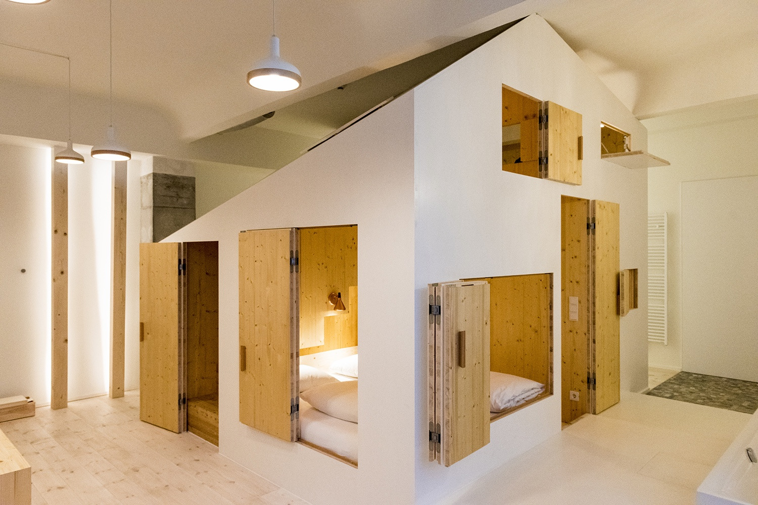 The Hideouts rooms: self-contained universes; life-size toys waiting to be discovered one hinge at a time. Every angle has been rigorously considered, yet nothing about them feels rigid. It's like a playground. A very well-thought-out one.