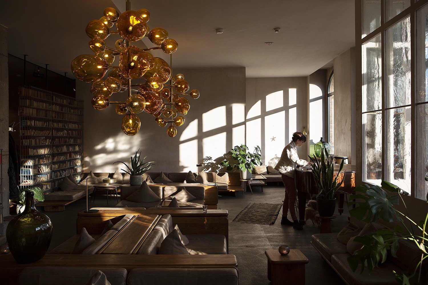 Nadine Michelberger at the Michelberger hotel lobby. A spacious, natural light-filled living room that became one of Berlin's most beloved creative meeting points.