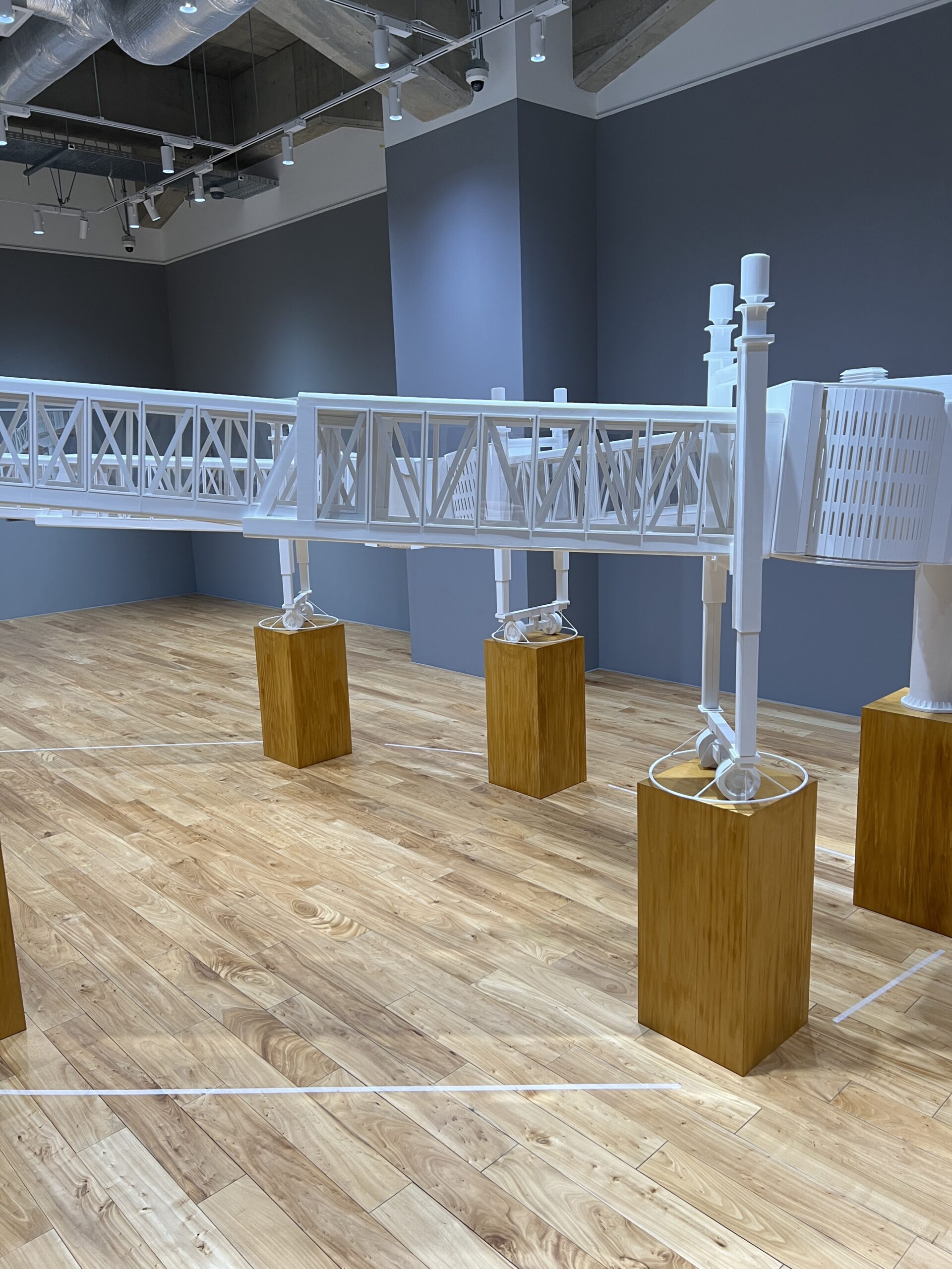 DOMINO ARCHITECTS’ PULP FICTION (jetway) at WHAT MUSEUM, reimagining airport boarding bridges as a surreal architectural loop