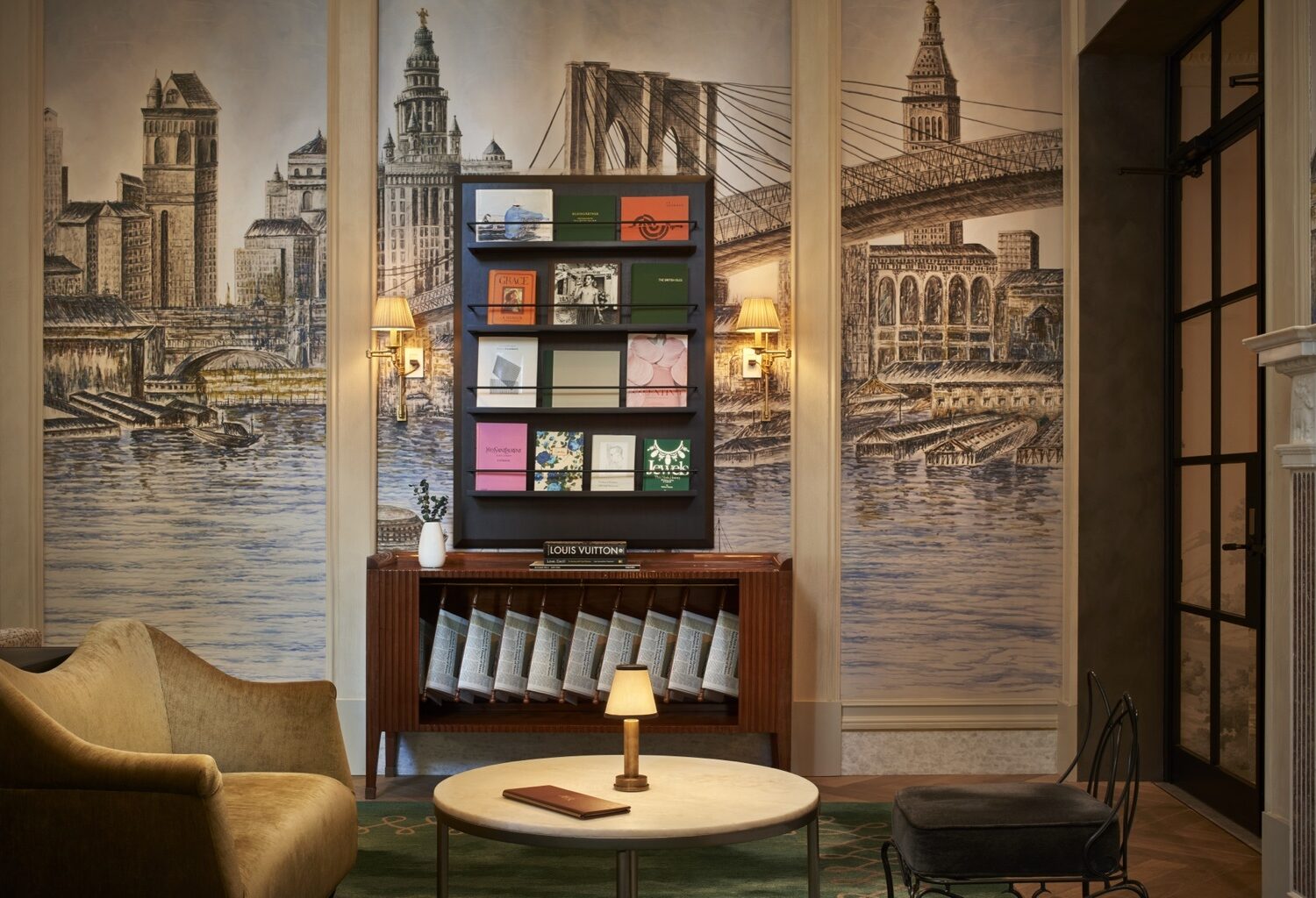 The Wall Street Hotel A hand-painted historic New York cityscape surrounds the library at Lounge on Pearl, one of the hotel’s more theatrical gestures.