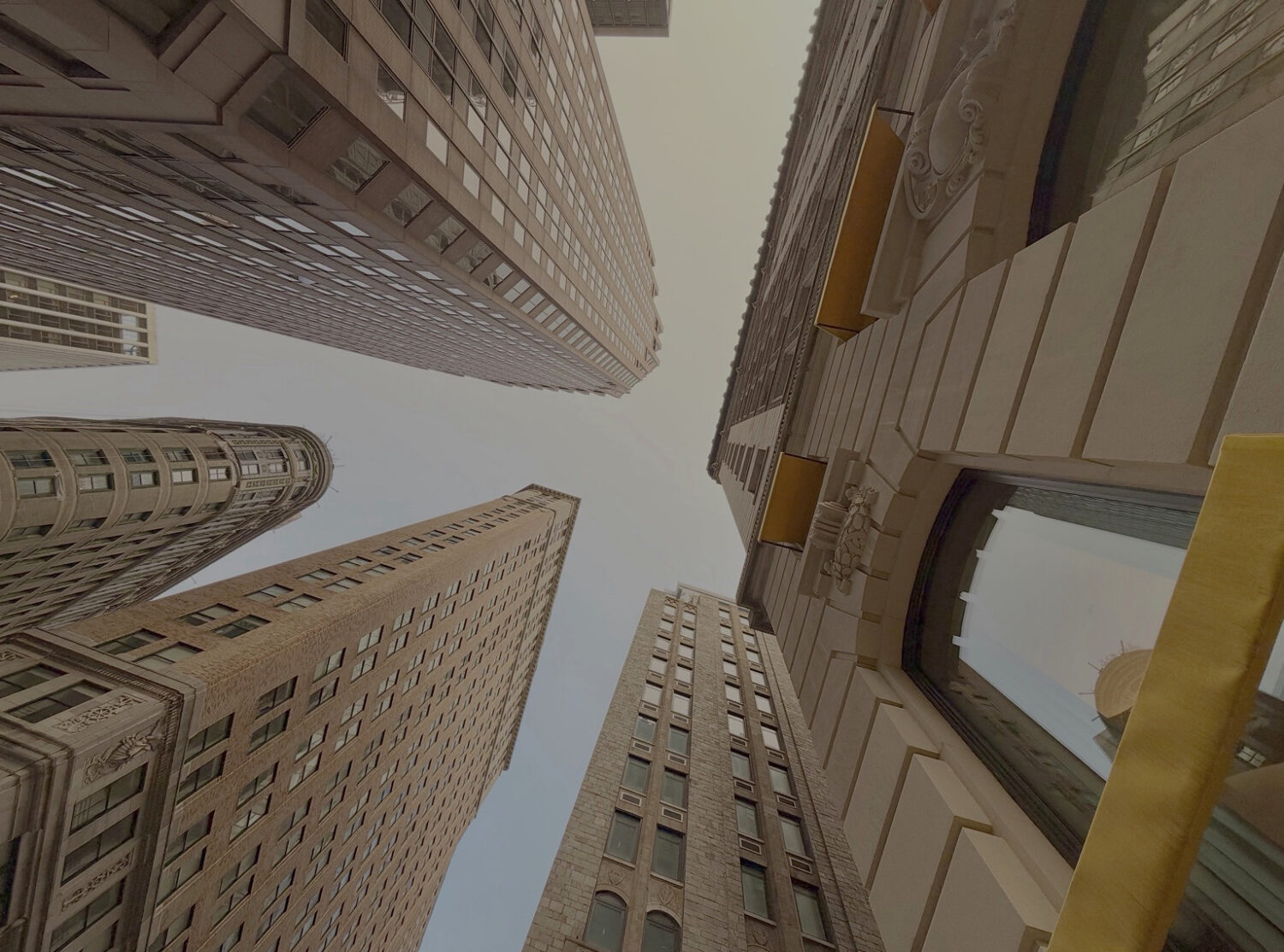 The Wall Street Hotel Looking up from Wall Street: the Financial District’s dense mix of historic masonry.