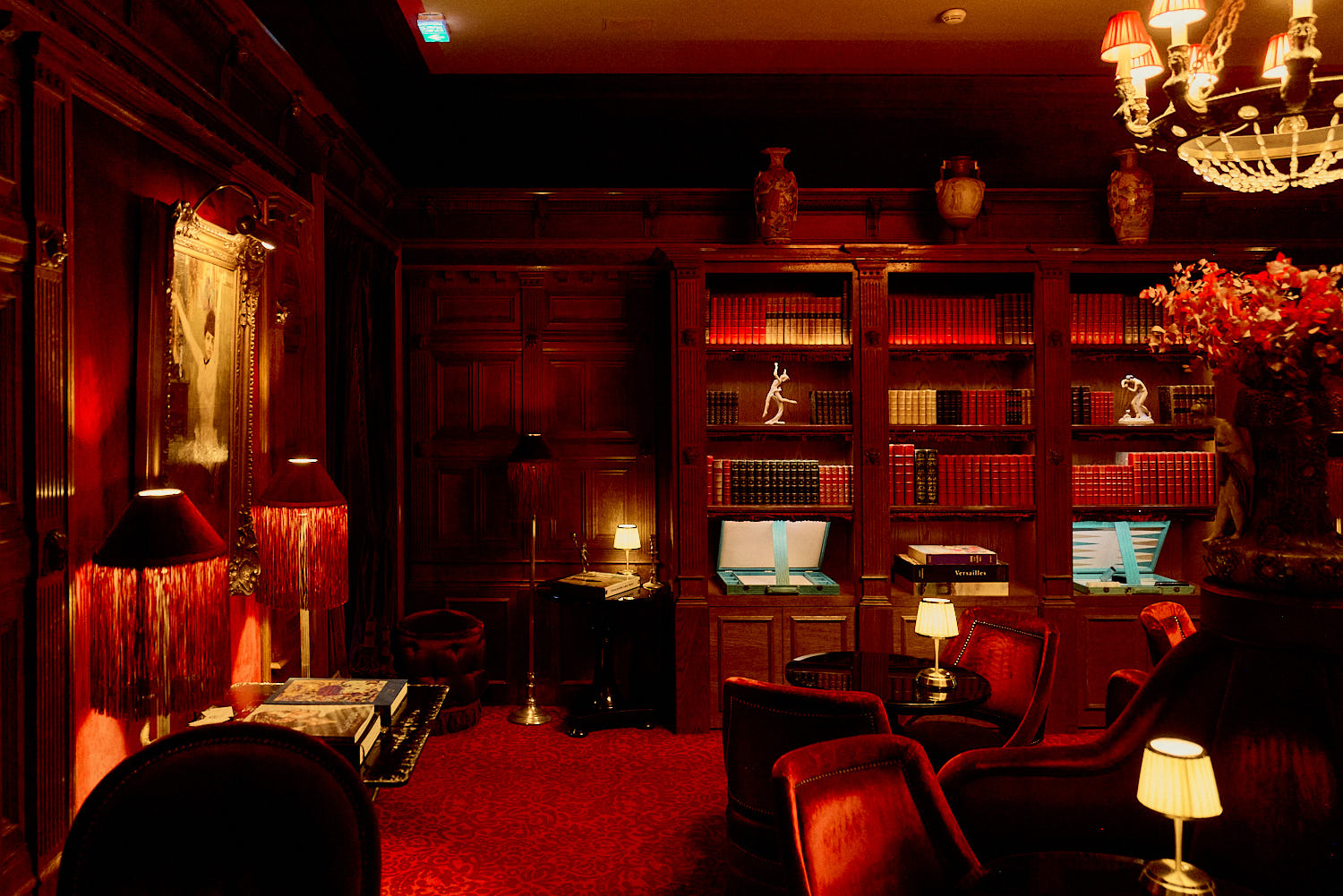Maison Souquet Antique books, board games, and a Charles Swyncop canvas set the mood
